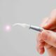 Dental laser handpiece with a glowing tip